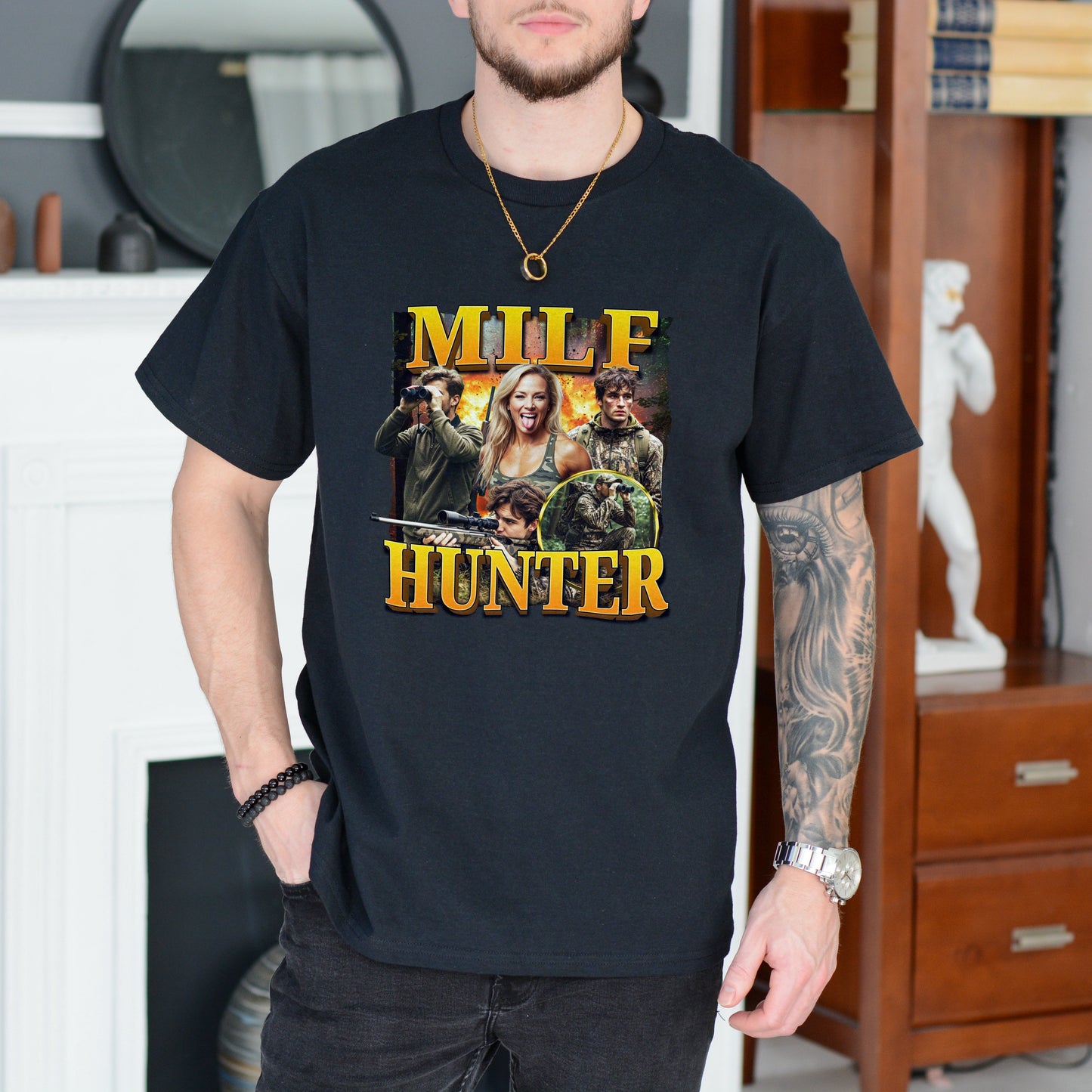 Person wearing a black t-shirt with a graphic design and text in a room.