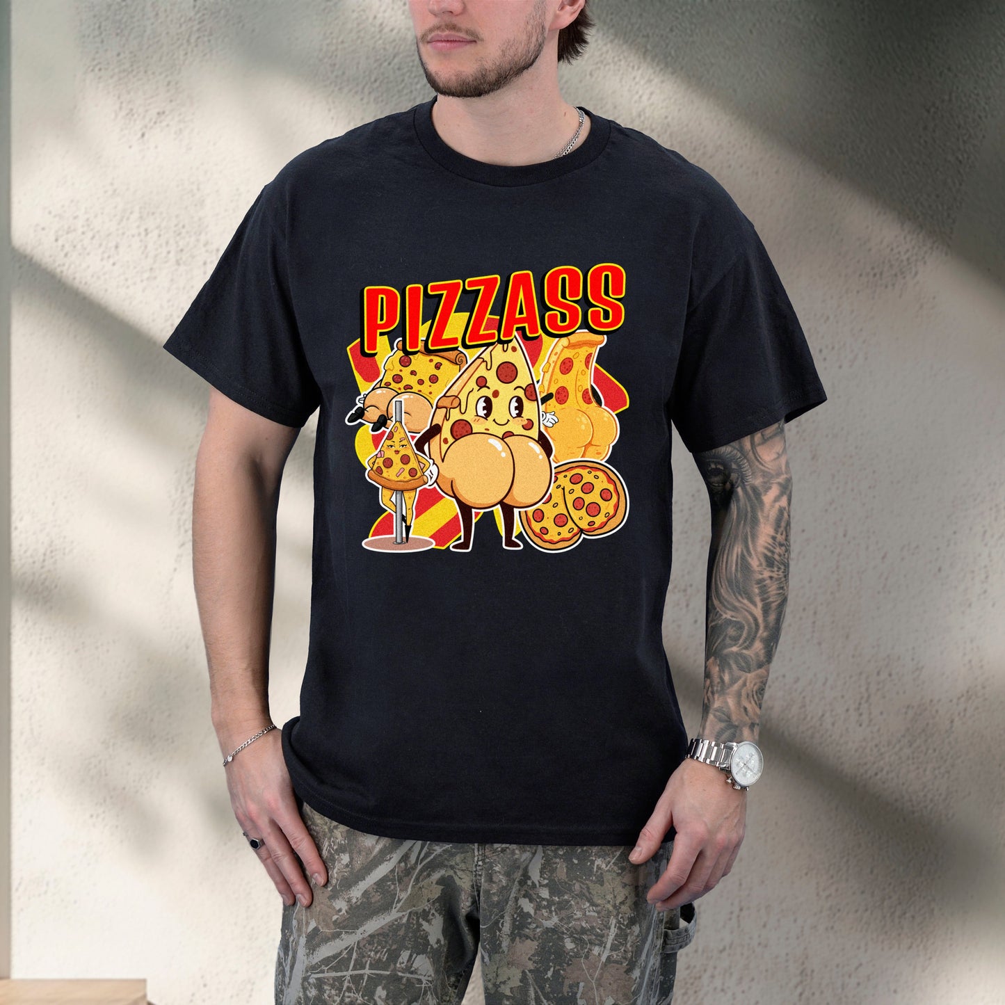 Person wearing a black t-shirt with a pizza-themed graphic design.