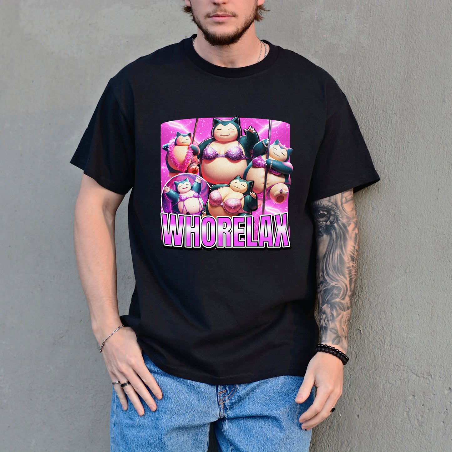 Person wearing a black t-shirt with a graphic design and text against a gray background