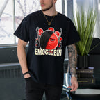 Person wearing a black t-shirt with a graphic design and text, standing indoors.