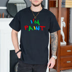 Person wearing a black t-shirt with colorful text in a room.
