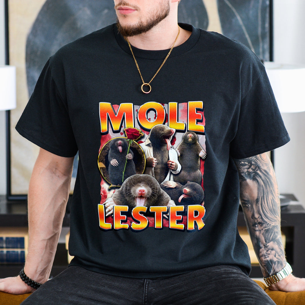 Person wearing a black t-shirt with 'Mole Lester' graphic design