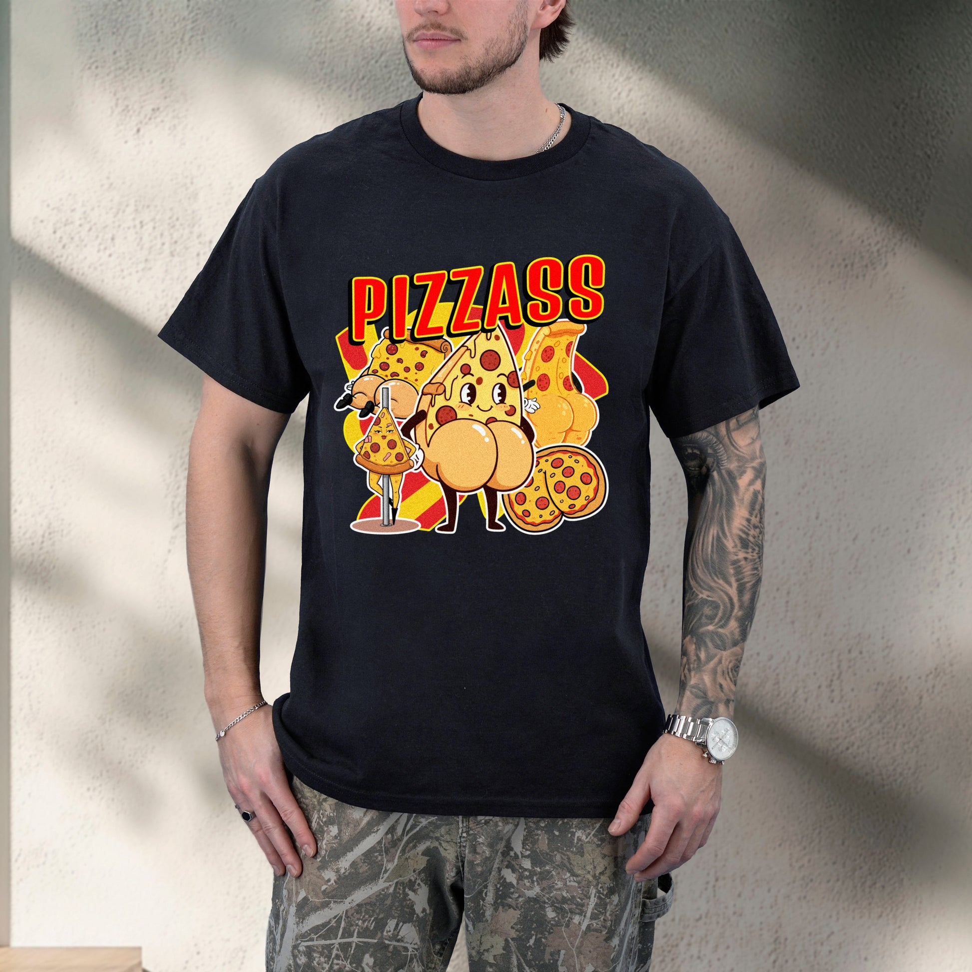 Person wearing a black t-shirt with a pizza-themed graphic design.
