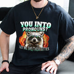 Person wearing a black t-shirt with a graphic design and text.